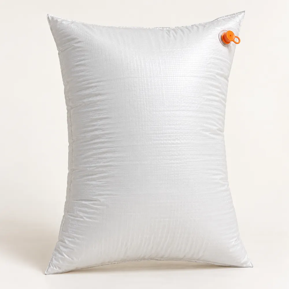 White woven dunnage air bag with an orange inflation valve